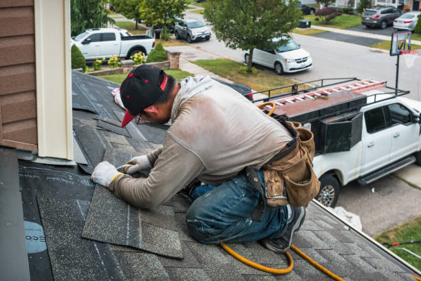 Professional Roof Replacement technician working in Rye, NH